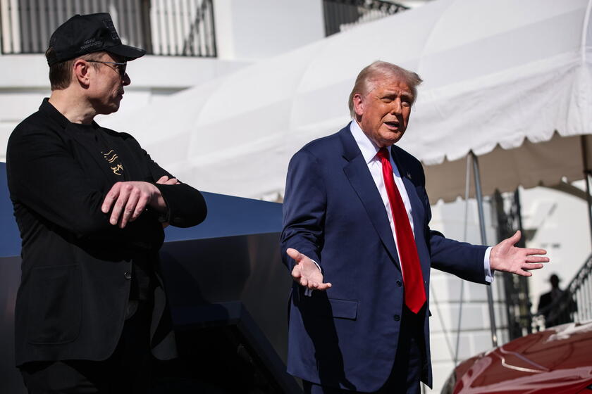 US President Trump views Tesla vehilces in front of the White House